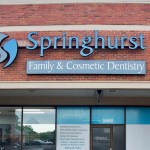 Springhurst Family & Cosmetic Dentistry - brick building exterior with blue and white signage